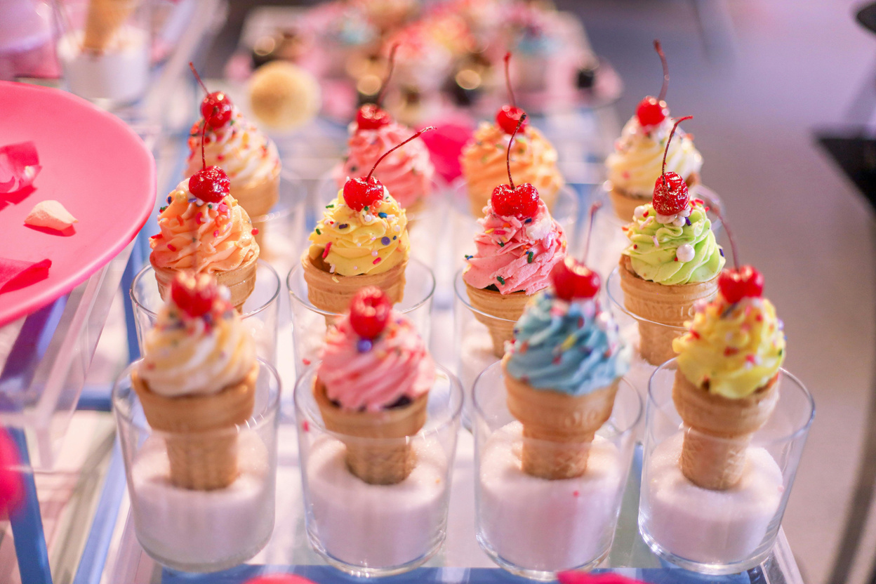 Colorful homemade ice cream treats made by children at summer camp